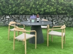 FLUTED CONICAL BASE ROUND CONCRETE DINING TABLE